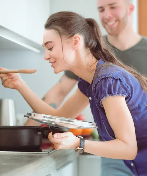 Couple tasting food